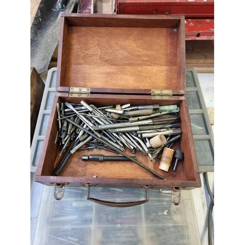 605 - A collection of tools to include late 19th/early 20th century tool box, tap and dies etc.