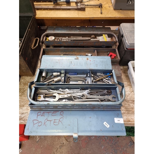 609 - Two vintage metal cantilever tools chests containing a large collection of tools to include spanners... 