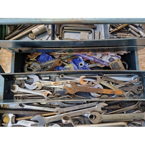 609 - Two vintage metal cantilever tools chests containing a large collection of tools to include spanners... 