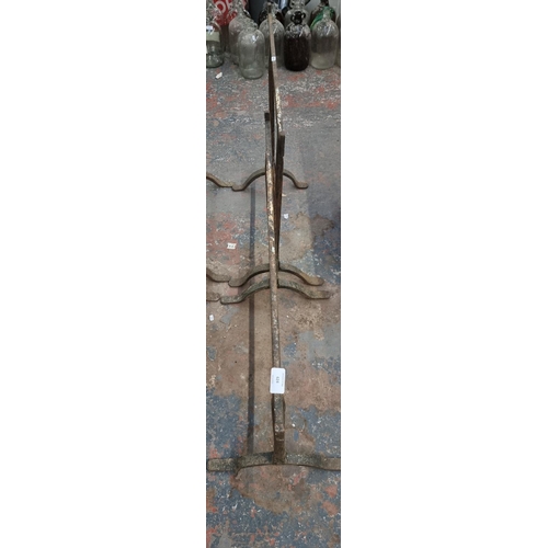 624 - A pair of 19th century wrought iron trestles - both approx. 76cm high x 76.5cm wide