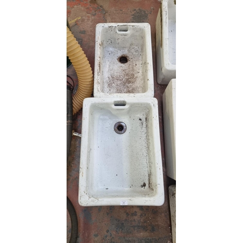 629 - Two Twyfords ceramic sinks - largest approx. 26cm high x 47cm wide x 62cm long