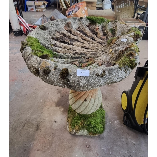 638 - A cast stone scalloped bird bath on twisted pedestal base - approx. 74cm high x 57cm diameter