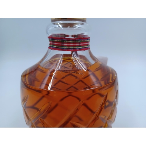 538 - A 75cl Wedgwood Full Lead Crystal decanter limited edition 351 of 500 containing Drambuie Scotch whi... 