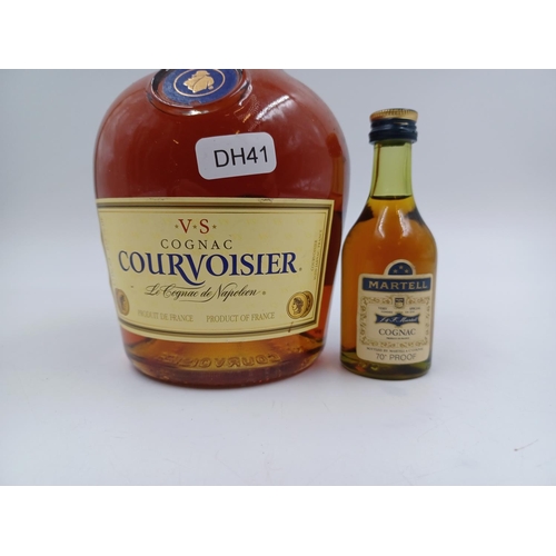 542 - Two bottles of V.S. Cognac, one 70cl Courvoisier - bottled at 40% and one Martell miniature - bottle... 