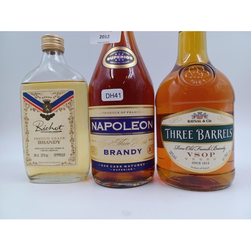 550 - Three bottles of French brandy, one 70cl Three Barrels V.S.O.P. bottled at 38%, one 70cl Aldi Napole... 