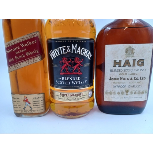 551 - Three bottles of blended Scotch whisky, one 70cl Whyte & Mackay - bottled at 40%, one 13⅓ fl. oz. Ha... 