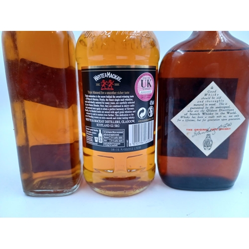 551 - Three bottles of blended Scotch whisky, one 70cl Whyte & Mackay - bottled at 40%, one 13⅓ fl. oz. Ha... 