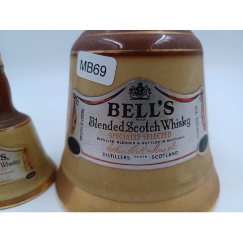 554 - Two Wade decanters of Bell's blended Scotch whisky, one 50cl and one miniature - both bottled at 40%