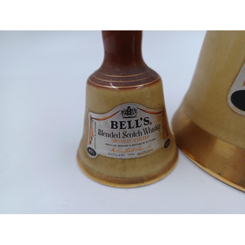 554 - Two Wade decanters of Bell's blended Scotch whisky, one 50cl and one miniature - both bottled at 40%