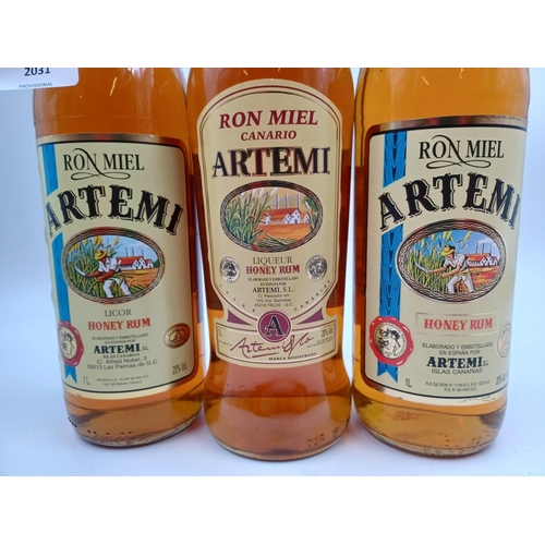 577 - Three 1L bottles of Canarian Artemi honey rum liqueur - bottled at 20%