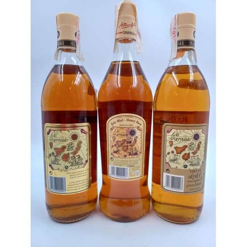 577 - Three 1L bottles of Canarian Artemi honey rum liqueur - bottled at 20%