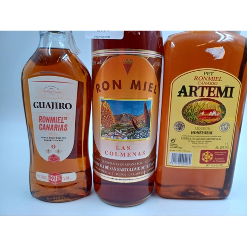 578 - Three bottles of honey rum liqueur, one 1L Artemi, one 1L Las Colmenas and one one 50cl Guajiro - al... 