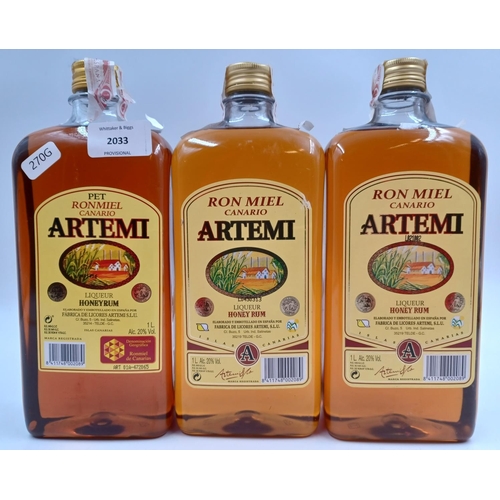 579 - Three 1L bottles of Canarian Artemi honey rum liqueur - bottled at 20%