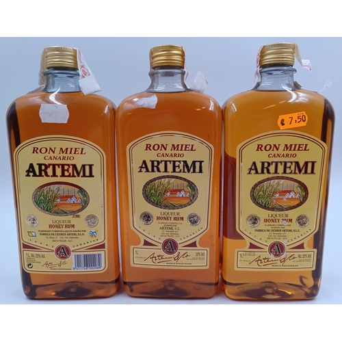 580 - Three 1L bottles of Canarian Artemi honey rum liqueur - bottled at 20%