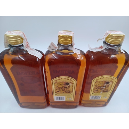 580 - Three 1L bottles of Canarian Artemi honey rum liqueur - bottled at 20%