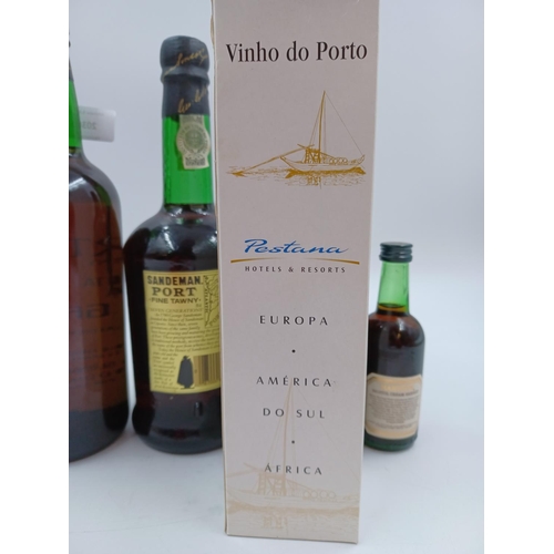 584 - Four bottles of fortified wine, one 75cl Quinta da Pulga tawny Port - bottled at 20%, one 70cl Sande... 