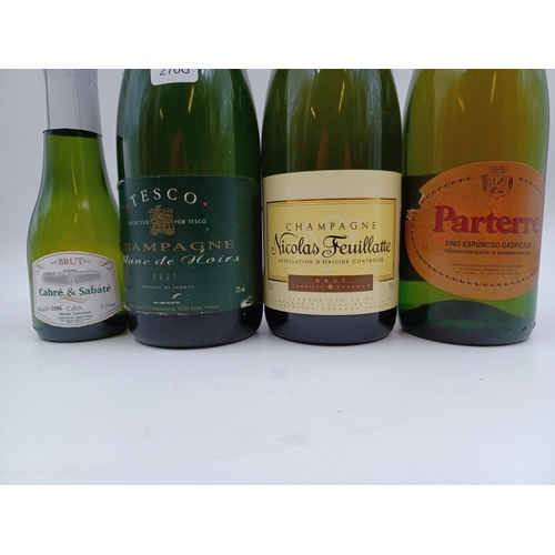 594 - Four bottles of sparkling wine, one 75cl Nicolas Feuillatte Brut Champagne - bottled at 12%, one 75c... 