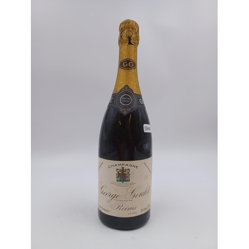 595 - A mid 20th century bottle of George Goulet extra dry Champagne sparkling wine - ABV not stated, pres... 