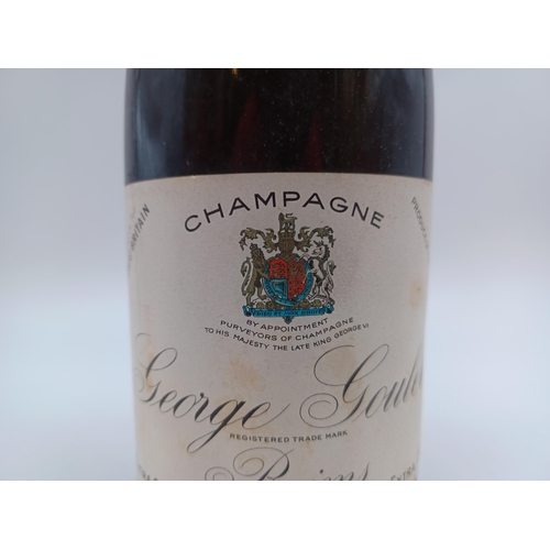 595 - A mid 20th century bottle of George Goulet extra dry Champagne sparkling wine - ABV not stated, pres... 