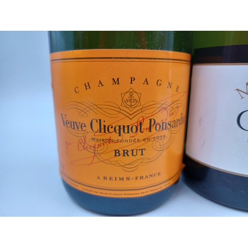 596 - Three 75cl bottles of sparkling wine, two Veuve Clicquot Ponsardin brut Champagne - bottled at 12% a... 