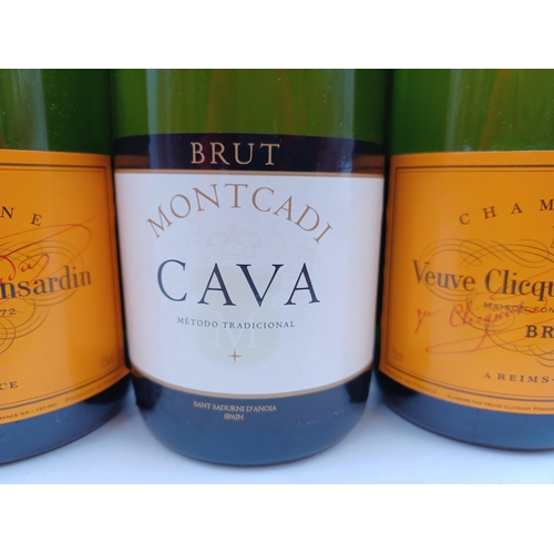 596 - Three 75cl bottles of sparkling wine, two Veuve Clicquot Ponsardin brut Champagne - bottled at 12% a... 