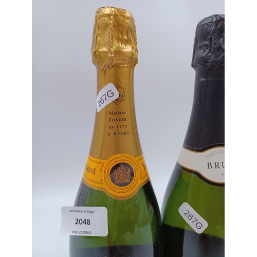 596 - Three 75cl bottles of sparkling wine, two Veuve Clicquot Ponsardin brut Champagne - bottled at 12% a... 