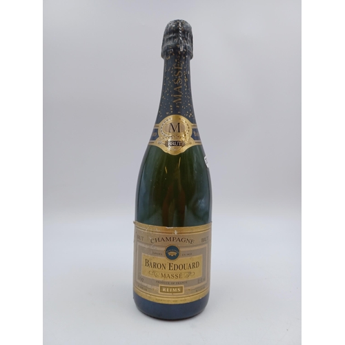 597 - A 75cl bottle of Baron Edouard Massé brut Champagne sparkling wine - bottled at 12.5%