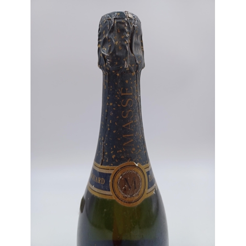 597 - A 75cl bottle of Baron Edouard Massé brut Champagne sparkling wine - bottled at 12.5%