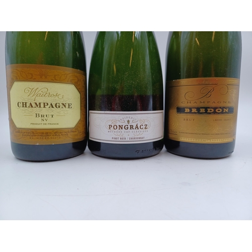 599 - Three 75cl bottles of sparkling wine, one Waitrose brut Champagne - bottled at 12.5%, one Bredon bru... 