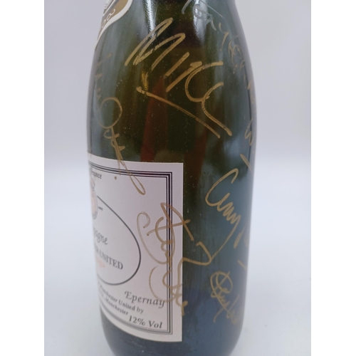 602 - A signed early 1990s 75cl bottle of Charles Bonnaire 'Manchester United ' Champagne sparkling wine -... 