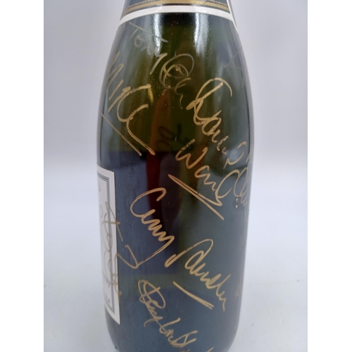 602 - A signed early 1990s 75cl bottle of Charles Bonnaire 'Manchester United ' Champagne sparkling wine -... 