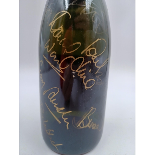 602 - A signed early 1990s 75cl bottle of Charles Bonnaire 'Manchester United ' Champagne sparkling wine -... 