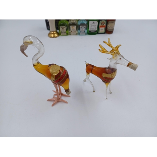 606 - A collection of miniatures to include two Dutch Rynbende's apricot brandy animals, three Meunier liq... 