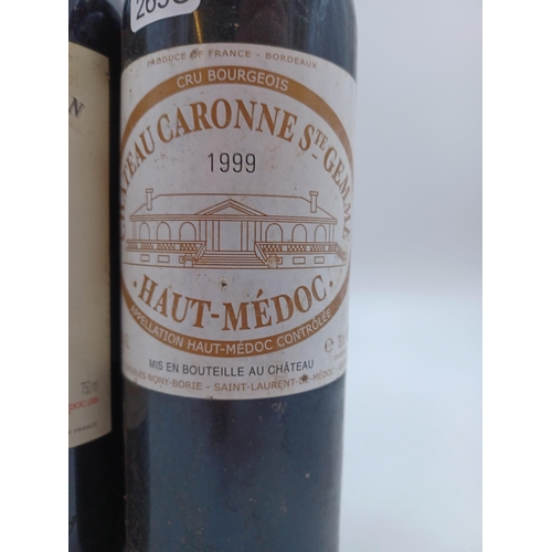 611 - Three 75cl bottles of French red wine, one 1999 Château Lannessan Haut-Médoc, one 1999 Château Caron... 