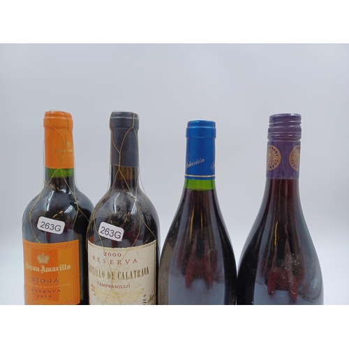 623 - Four 75cl bottles of red wine, one Portuguese 2013 Dão, one Spanish 2001 Faustino Selección de Famil... 