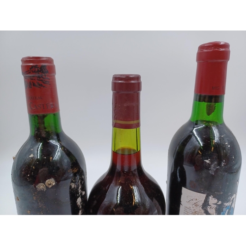 619 - Three 75cl bottles of French red wine, one 1987 Château Puy Castera Cru Bourgeois Haut-Médoc, one 19... 