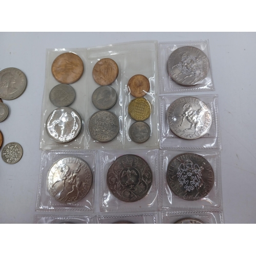 1230 - A collection of coins to include 90% silver American 1883 'Morgan' dollar, four 50% silver half crow... 