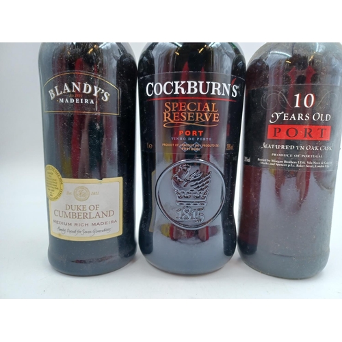 583 - Three bottles of fortified wine, one 1L Cockburn's Special Reserve Port - bottled at 20%, one 75cl M... 