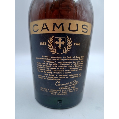 565 - A boxed 1960s bottle of Camus La Grande Marque Célébration Cognac (bottle no.130163) - size and ABV ... 