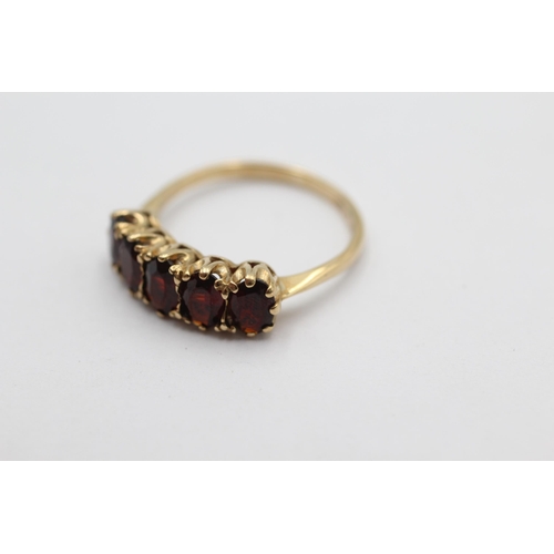 1012 - A 9ct gold garnet gypsy setting ring, size Q½ - approx. gross weight 2.7 grams