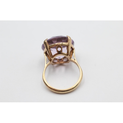 1017 - A 9ct gold amethyst cocktail ring, size K½ - approx. gross weight 5.7 grams