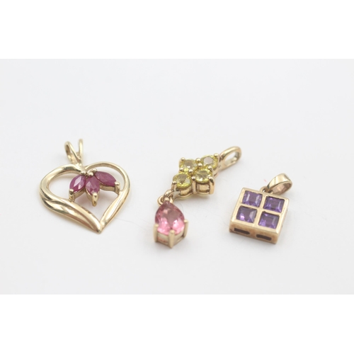 1025 - Three 9ct gold gemstone pendants, one amethyst, one pink tourmaline and sapphire and one ruby - appr... 