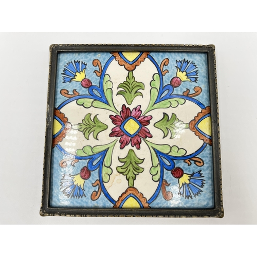 218 - Two ceramic tiles, Malkin Johnson 15.5cm square and hand-painted by Chamizer in Israel 16cm square