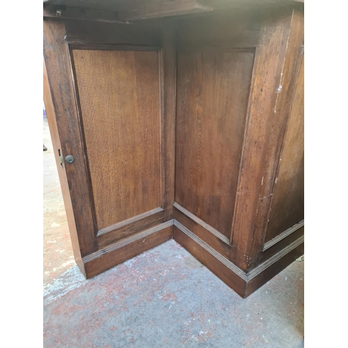 59 - A mid 20th century oak folding drinks cabinet/bar - approx. 97cm high x 183cm wide x 66cm deep