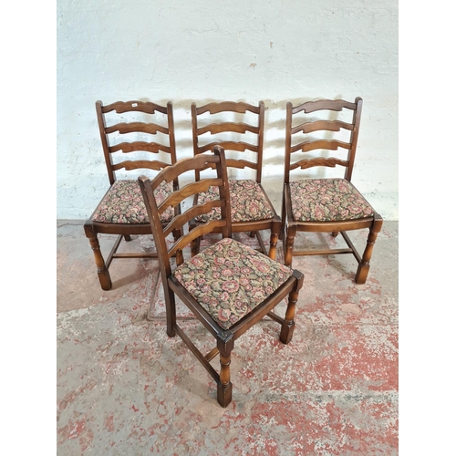 101 - A set of four Priory oak dining chairs