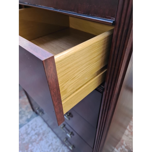 104 - A Silentnight Cabinets mahogany effect chest of two short over four long drawers - approx. 109cm hig... 