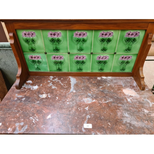 110 - An Edwardian satinwood wash stand with marble top and ceramic tiled splashback - approx. 117cm high ... 