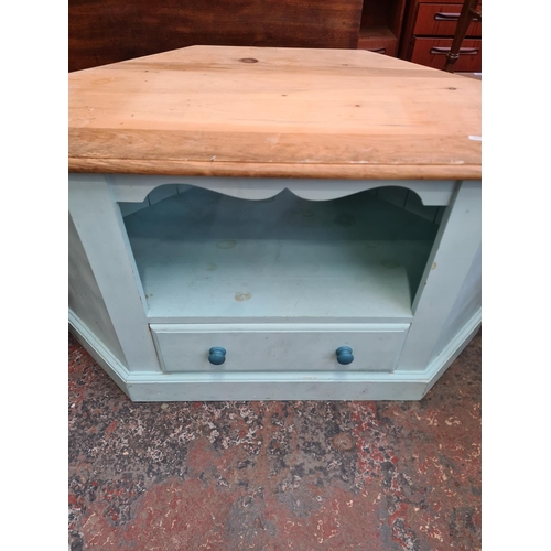 118 - A modern painted pine corner TV stand - approx. 61cm high x 112cm wide x 58cm deep