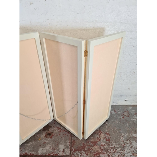 125 - A modern white painted four section folding dressing screen - approx. 126cm high x 204cm wide