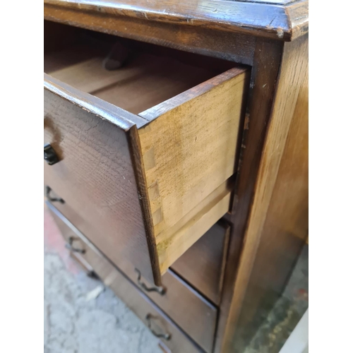 127 - An Art Deco style oak chest of four drawers - approx. 99cm high x 78cm wide x 47cm deep